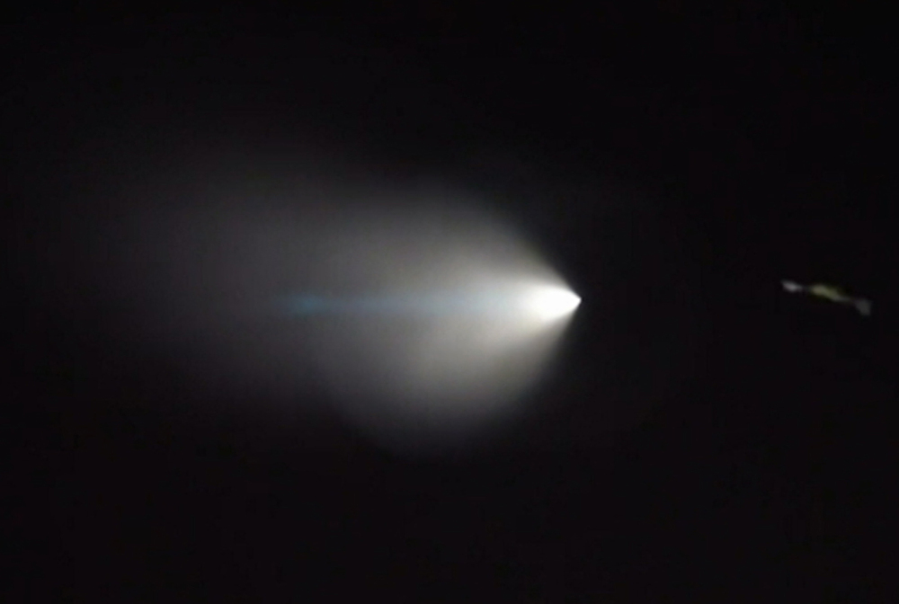 An unarmed missile fired by the Navy from a submarine off the coast of Southern California created a bright light that streaked across the state and was visible as far away as Nevada and Arizona.