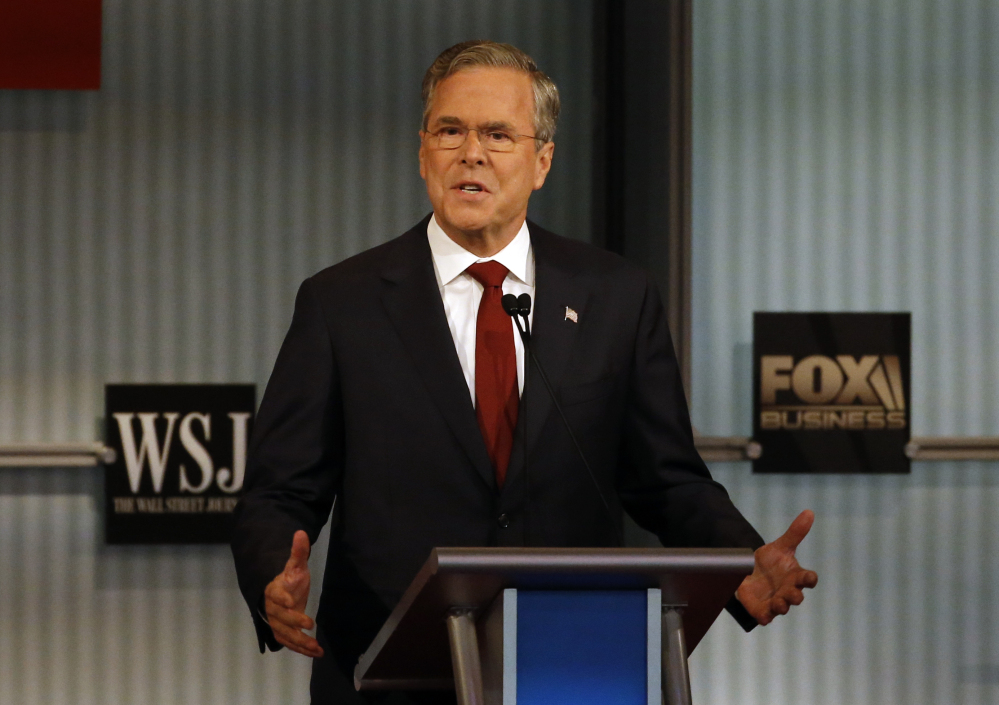 Jeb Bush speaks during Tuesday's Republican presidential debate. Bush criticized Democrat Hillary Clinton for pledging to build on President Obama’s economic policies.
The Associated Press