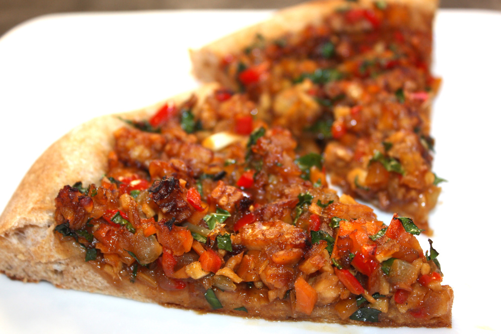 An Asian stir-fry pizza recipe pairs East and West and is a tempeh-lover’s dream pizza. Avery Yale Kamila photo
