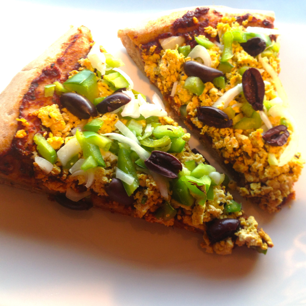 This cheese- and meat-free pizza features roasted tofu with herbs. Avery Yale Kamila photo
