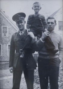 Pfc. Thomas Whitney, left, and Justin Whitney, right, hold aloft the baby of the family, John, at their childhood home in Augusta. John “Jack” Whitney and his wife, Madeline, will bring this photo to Saturday’s information-gathering event hosted by the Department of Defense’s POW/MIA Accounting Agency.