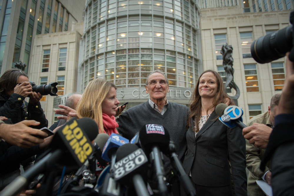 Vincent Asaro, center, leaves federal court Thursday in Brooklyn, N.Y., after he was acquitted of charges he helped plan a legendary 1978 Lufthansa heist retold in the hit film “Goodfellas.”