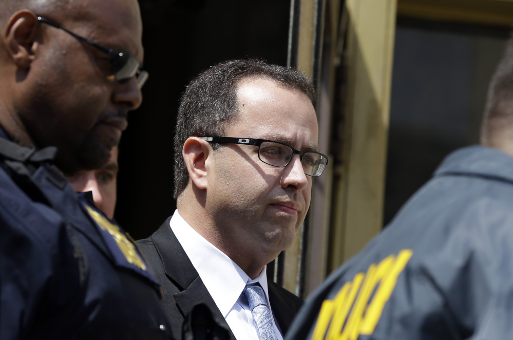 Former Subway spokesman Jared Fogle leaves court in Indianapolis in August after a hearing on child pornography charges.