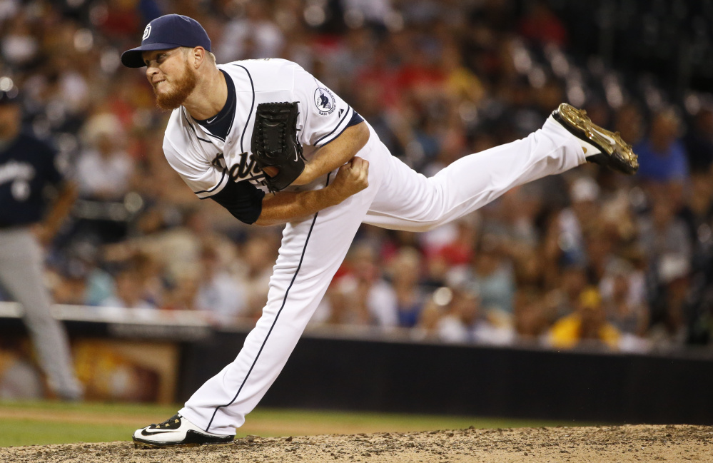 The Red Sox have acquired closer Craig Kimbrel from the San Diego Padres. Boston will send four minor-league prospects to the Padres, according to reports.