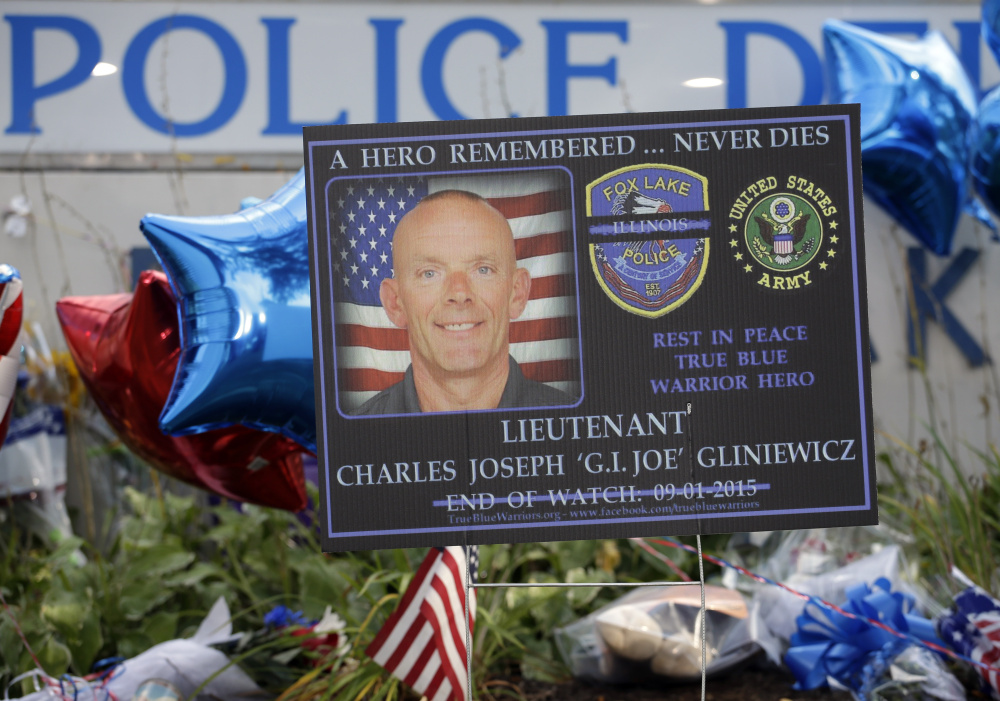 A memorial is in place at the Fox Lake Police Department in Fox Lake, Ill., on Sept. 2, when it was believed that Lt. Charles Joseph Gliniewicz was slain in the line of duty.