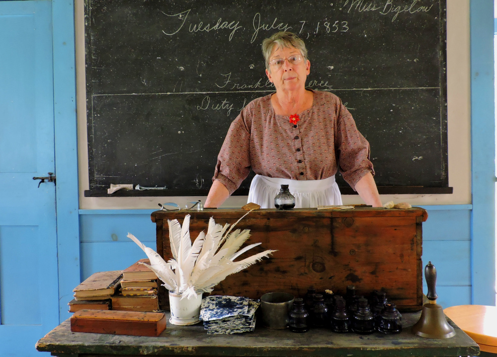 A historical interpreter from the Washburn-Norlands Living History Center in Livermore will portray a schoolmarm during a one-room schoolhouse re-enactment Wednesday at the South Berwick Senior Center on Norton Street.