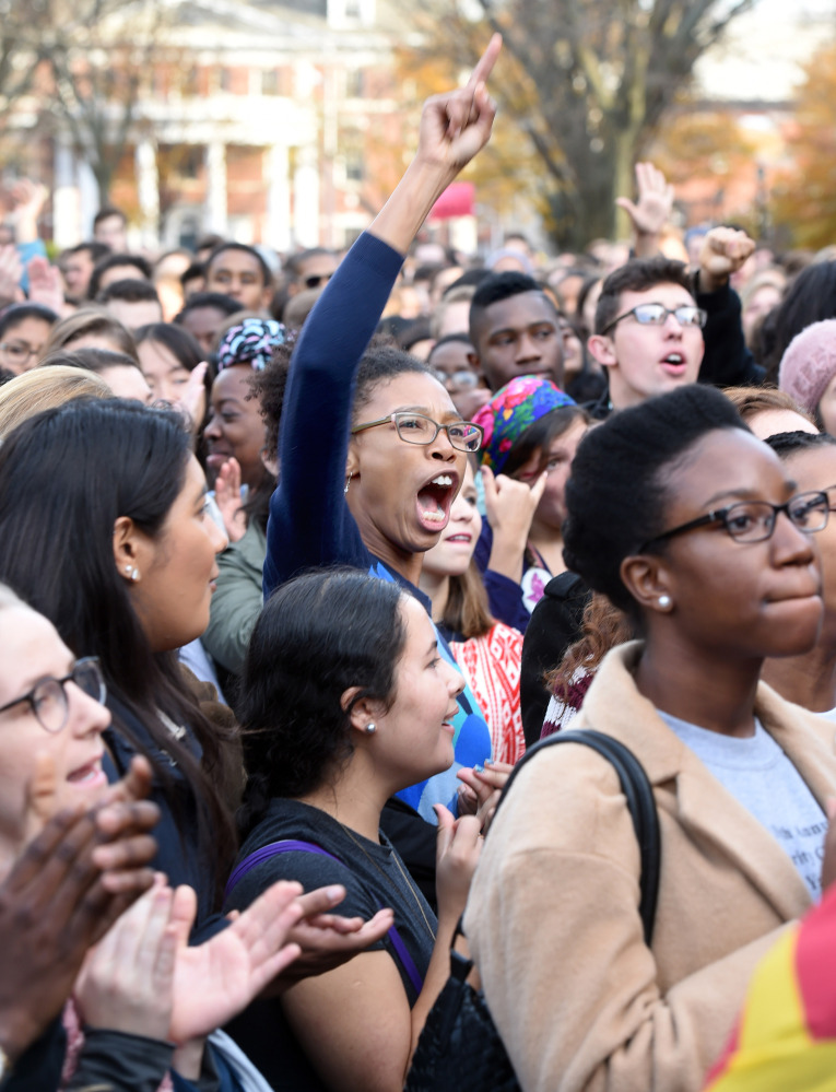 Students rally Nov. 9 to demand that Yale University become more inclusive. Experts say some recent college protests show confusion about the difference between vigorous debate and threats or harassment that constitute crimes.