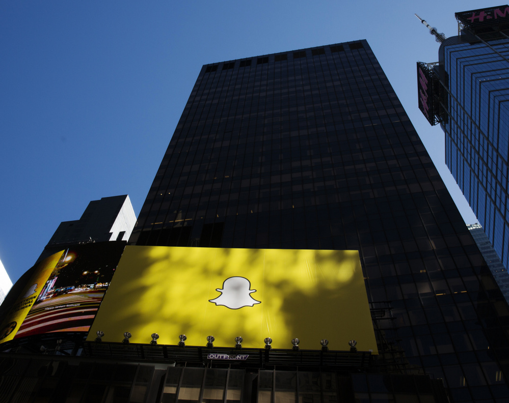 A billboard displays the logo of Snapchat above Times Square in New York earlier this year.
