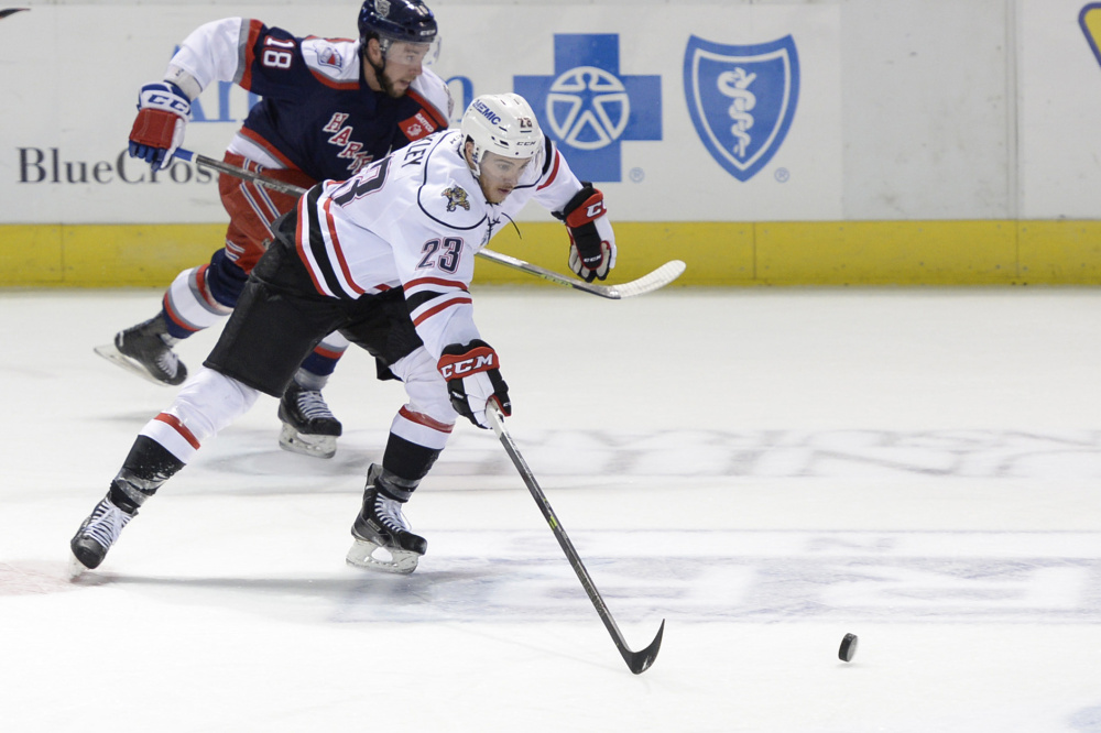 Connor Brickley of the Portland Pirates takes the puck down the ice Nov. 11. 
Shawn Patrick Ouellette/Staff Photographer
