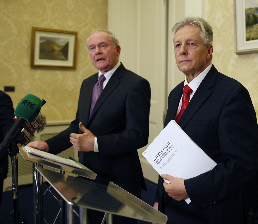 Northern Ireland First Minister Peter Robinson, right, and Deputy First Minister Martin McGuinness spent more than a year working on a deal between Catholics and Protestants.