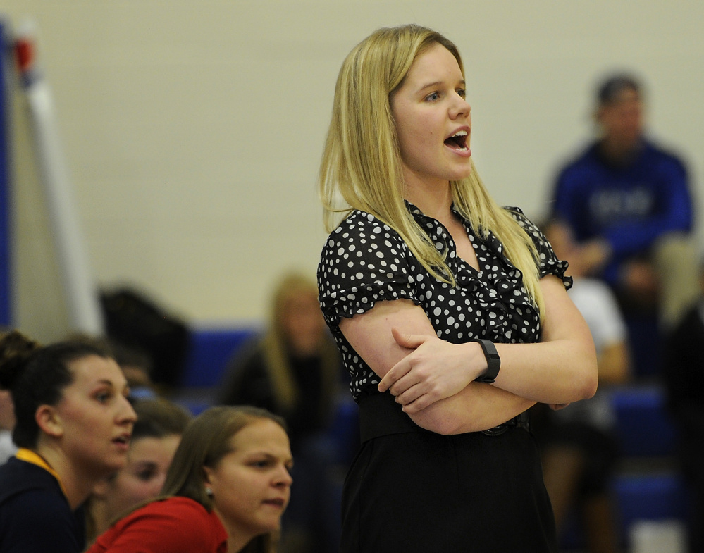 Samantha Allen, who took over as USM coach when Gary Fifled left after 27 years, encourages her players Tuesday night against UNE at Biddeford. Allen’s Huskies fell short down the stretch in losing 74.62.