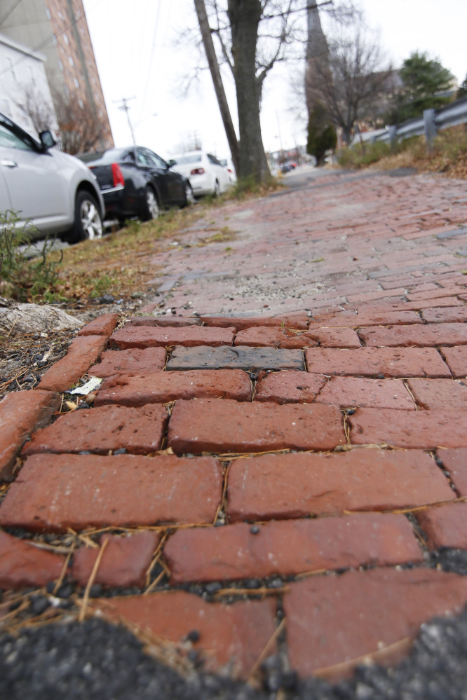 A close-up of the uneven brickwork between Pearl and Franklin Streets in Portland.
Jill Brady/Staff Photographer