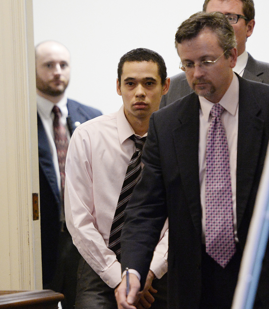 John Lopez, center, is among the men accused of murdering a Biddeford man in 2013. At right is his appointed attorney, Robert Ruffner.