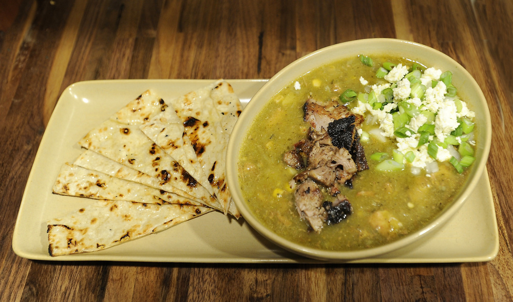 Green chili with smoked pork and scallions.
