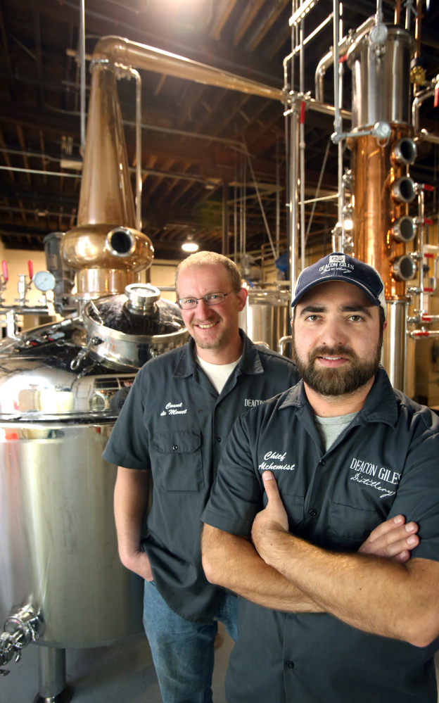 Deacon Giles Distillery co-founders Ian Hunter, left, and Jesse Brenneman worked together at Harpoon Brewery before deciding to launch their Salem distillery.