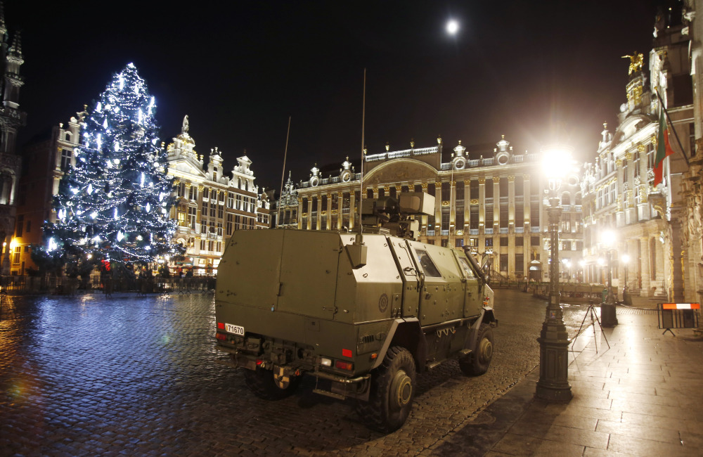 A police vehicle is parked at the Grand Place in downtown Brussels, Belgium, on Monday.