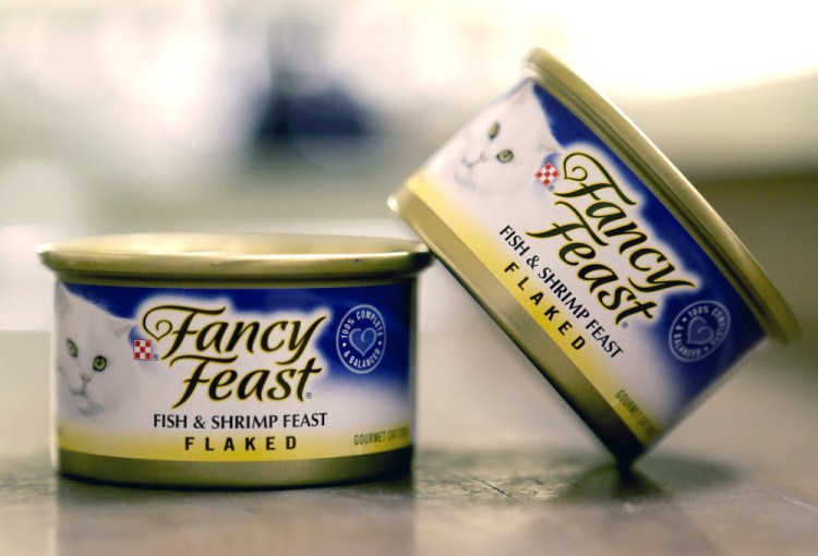 Fancy Feast cat food, fish and shrimp flavor, is a product of Thailand.