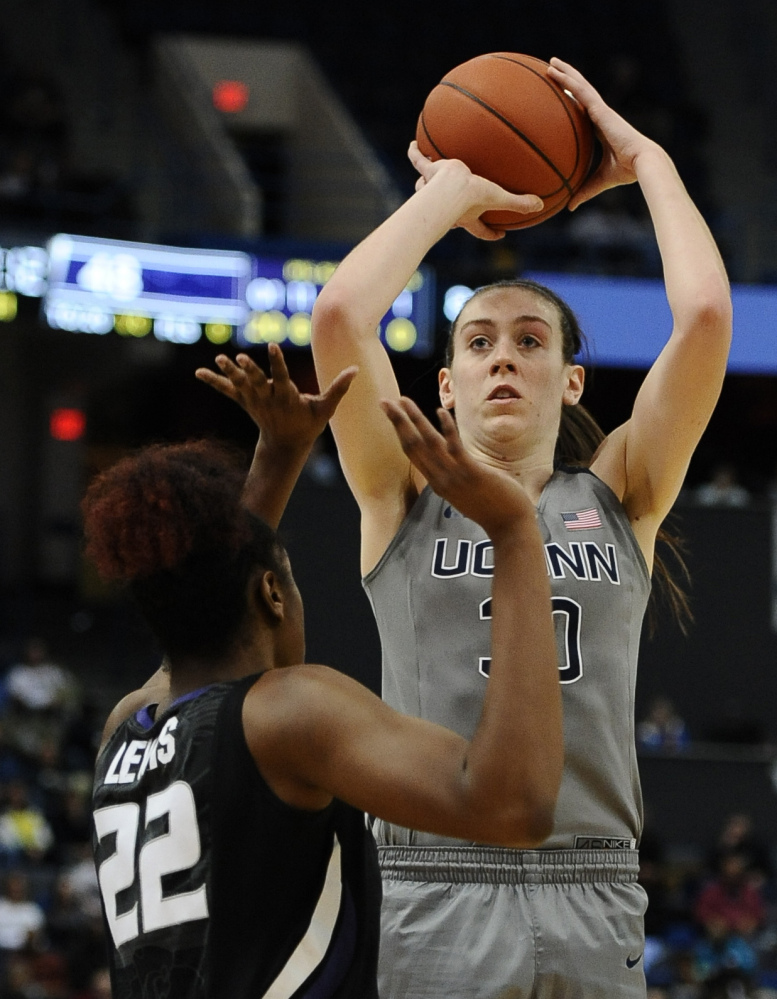 UConn’s Breanna Stewart shoots over Kansas State’s Breanna Lewis during the Huskies’ 97-57 win Monday in Hartford, Connecticut.