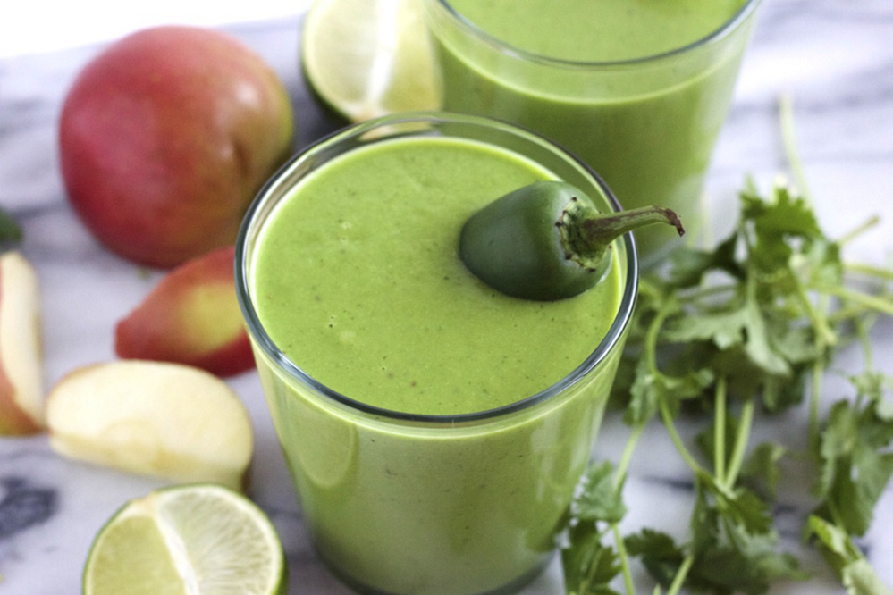 A smoothie from Green Blender made with collard greens, cilantro, an apple, lime juice, a jalapeno and camu camu powder. 