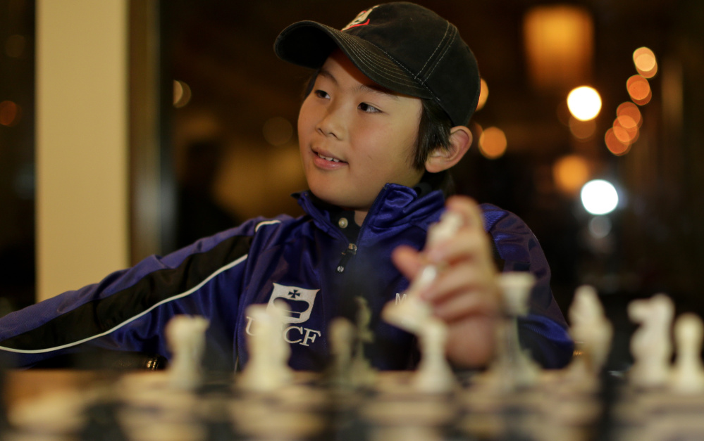 Maximillian Lu wasn’t quite 10 years old when he became the youngest chess master, and he recently represented the U.S. in international competition in Greece.