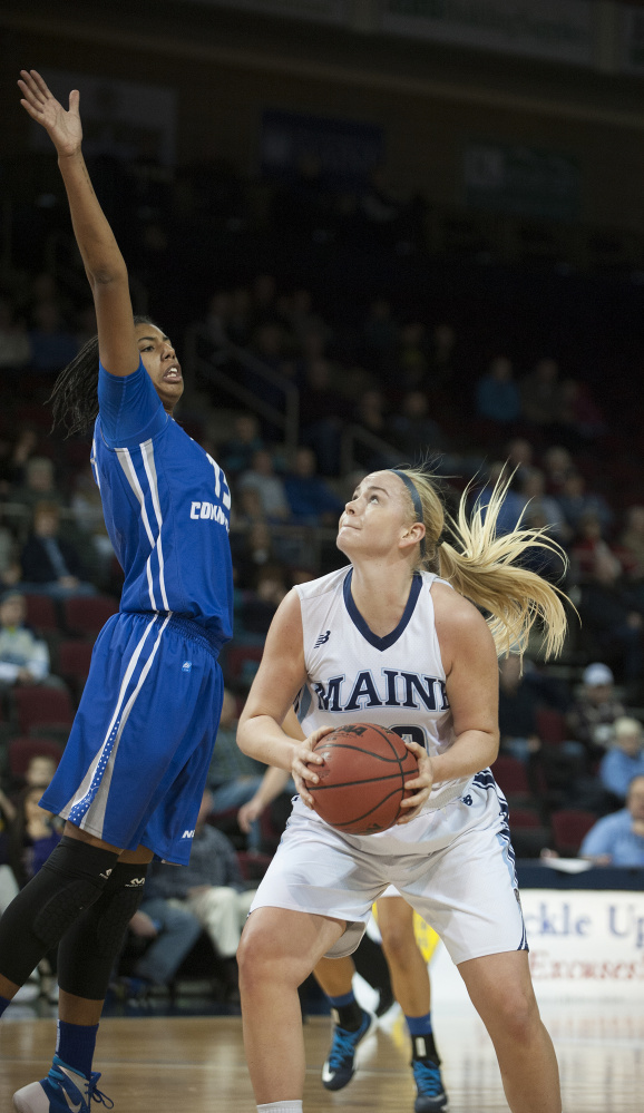 Mikaela Gustafsson of the University of Maine waits for Giocelis Reynoso of Central Connecticut State to return to the ground before shooting Wednesday. Maine won, 62-42.