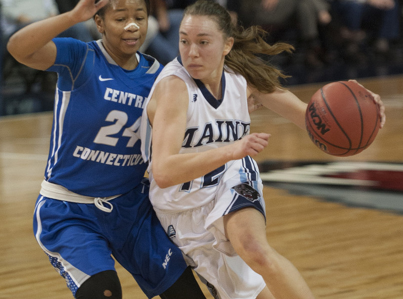 Maine’s Sigi Koizar drives to the basket against Central Connecticut State University’s Aleah Epps on Wednesday at the Cross Insurance Center. UMaine won, 62-42.