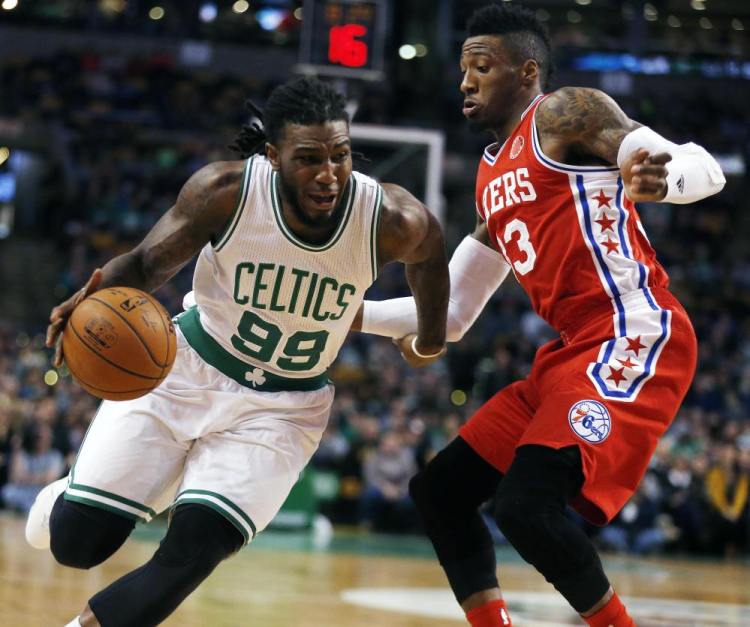 The Celtics’ Jae Crowder drives past the 76ers’ Robert Covington in the first quarter of Wednesday’s night’s game in Boston. Crowder hit the game-winning 3-pointer for the Celtics in the final minute.