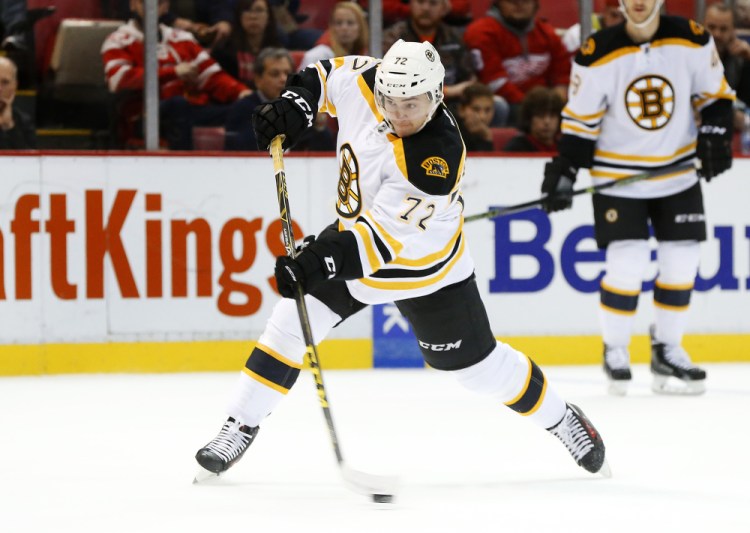 Bruins center Frank Vatrano shoots and scores against the Red Wings in the first period of Wednesday night’s game in Detroit. The Bruins came back from a 2-1 deficit late in the third period and won in overtime on another goal by Vatrano.