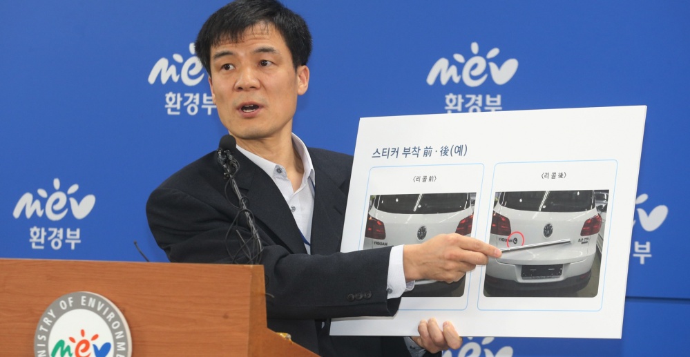 Hong Dong Gon, a director at the Ministry of Environment, speaks about Volkswagen vehicle emissions Thursday in Sejong, South Korea. He says the ministry will expand its investigation to look at other vehicle brands.