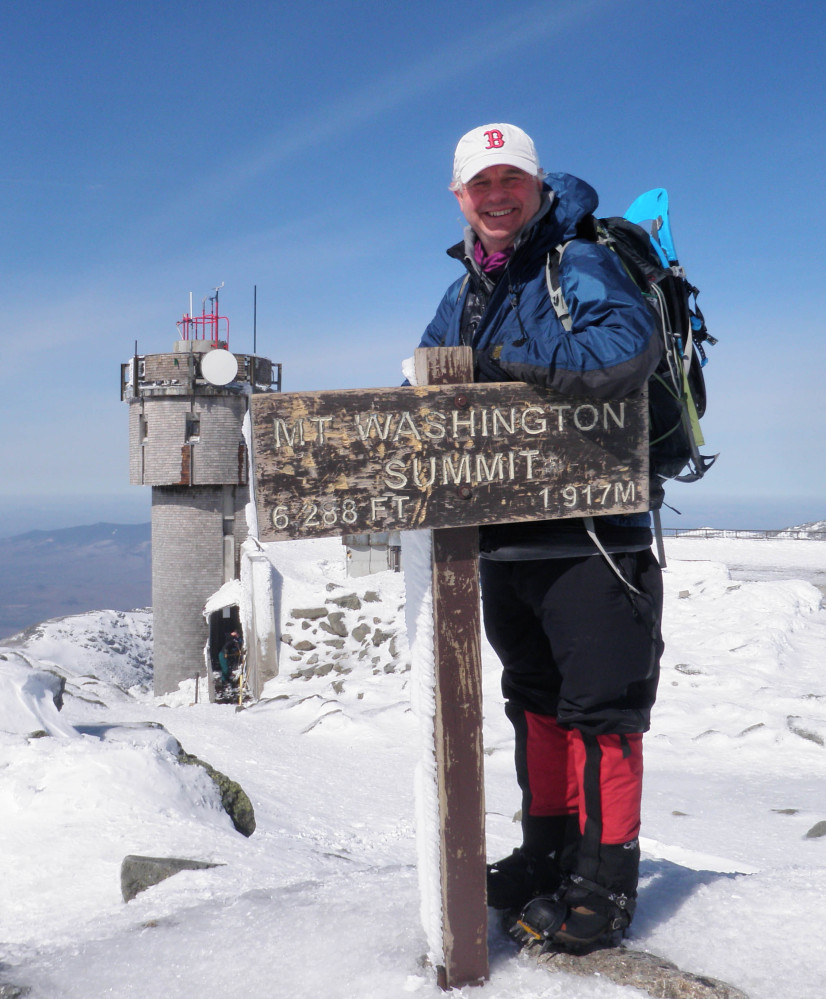 New Hampshire state Sen. Jeb Bradley reaches the top of Mount Washington in 2012. “I always say my favorite hike is the next one,” he said.