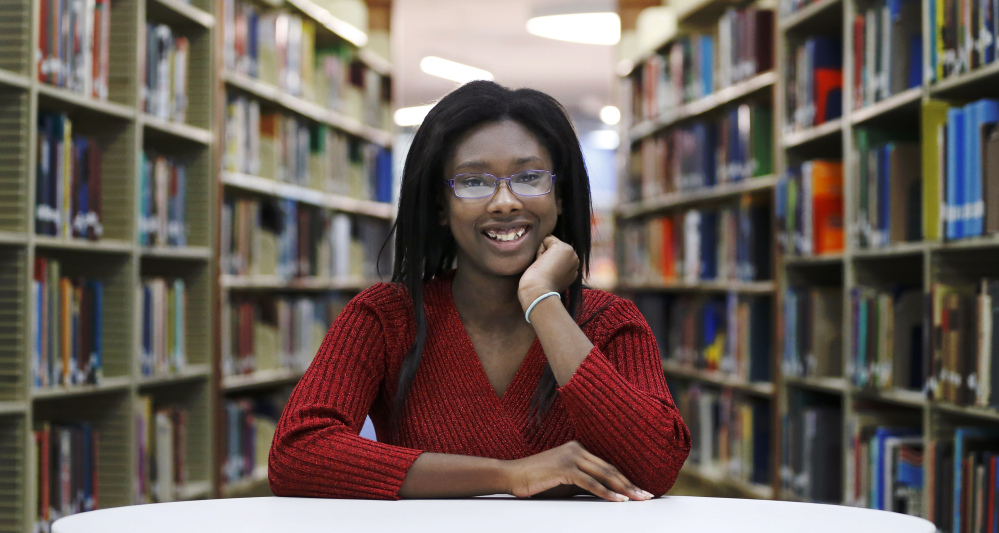 At Olive-Harvey College library, 18-year-old Octavia Coaks says she feels lucky to be able to take advantage of the city’s program for free community college. Addressing the costs of her education, Coaks said she doesn’t “want to put that kind of burden” on her parents.