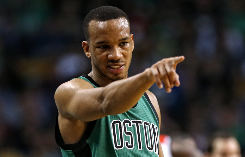 Avery Bradley points to a Celtics teammate in the first quarter of Boston’s runaway win against the Washington Wizards on Friday night in Boston. Bradley scored 16 points in the game.