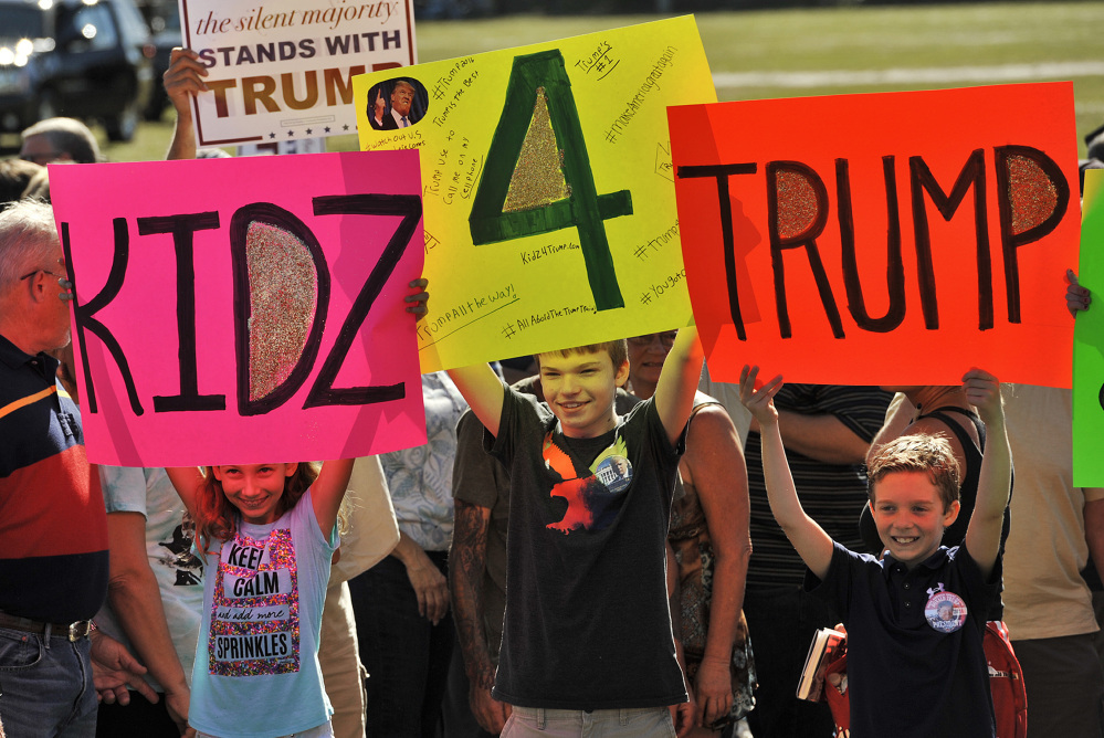 Young fans of Republican presidential candidate Donald Trump attend a campaign rally Saturday in Sarasota, Fla.