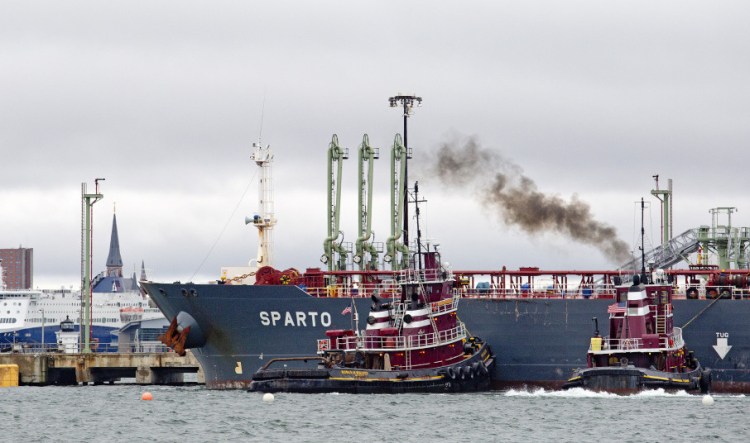 Tugboats guide the Cypriot tanker Sparto as it delivers more than 779,000 barrels of crude oil Saturday to Portland Pipe Line in South Portland, a scene that plays out only a couple of times a month now, officials say. “It’s a ghost town,” said Brian Fournier, president of Portland Tugboat.