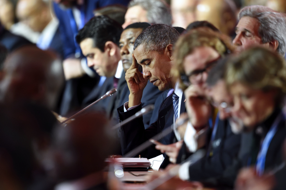 President Obama attends a session at the United Nations Climate Change Conference outside Paris on Monday.
