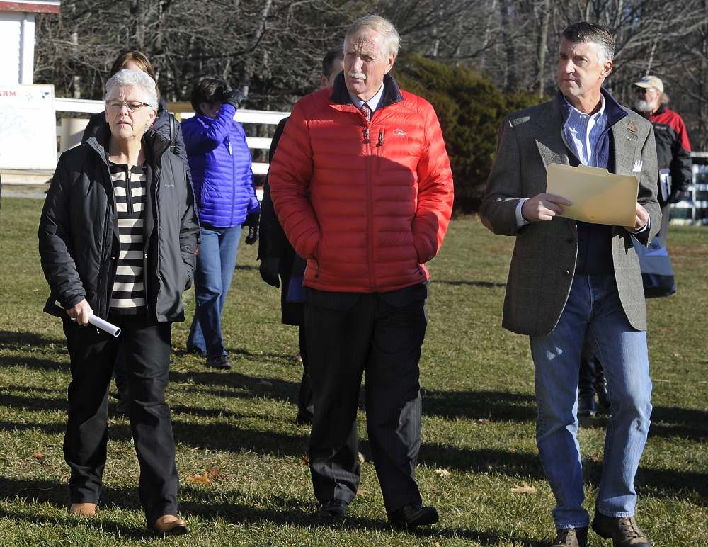 The head of the U.S. Environmental Protection Agency, Gina McCarthy, left, visits Smiling Hill Farm to talk with farmers and U.S. Sen. Angus King about new water quality rules. McCarthy and King were given a tour of the farm by Warren Knight, right, who owns the farm with his family.