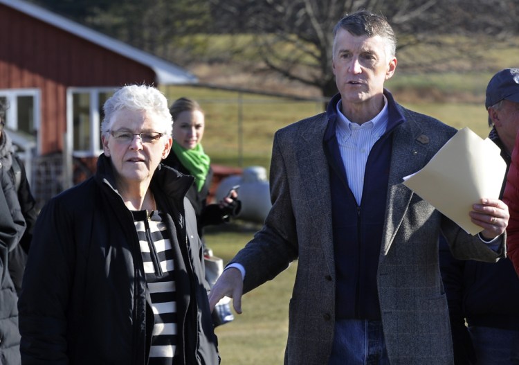 Gina McCarthy, the top administrator of the U.S. Environmental Protection Agency, visits Smiling Hill Farm in Westbrook to talk with farmers, including Warren Knight, right, who owns the farm with his family, on Monday. Farmers are concerned about new water quality rules.