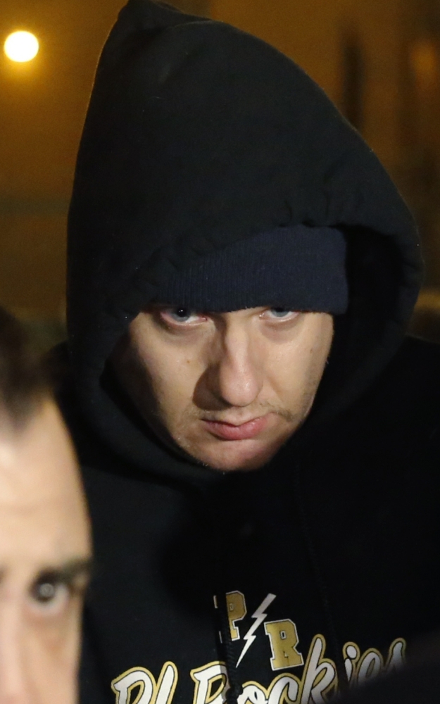 Chicago police Officer Jason Van Dyke leaves the Cook County Jail after posting bond Monday in Chicago. He had been locked up since Nov. 24.