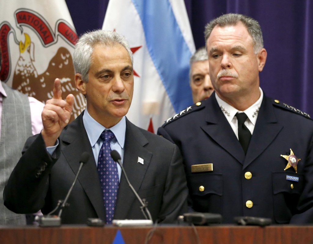 Chicago Mayor Rahm Emanuel, left, and Police Superintendent Garry McCarthy speak at a news conference Tuesday announcing first-degree murder charges against police Officer Jason Van Dyke in the Oct. 20, 2014, death of Laquan McDonald. The city then released the dash-cam video of the shooting.