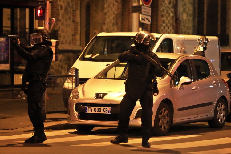 Police forces stage an operation early Wednesday that two officials said is linked to last week's terror attacks in Paris. Authorities in the Paris suburb of St. Denis told residents to stay indoors during the operation.
The Associated Press