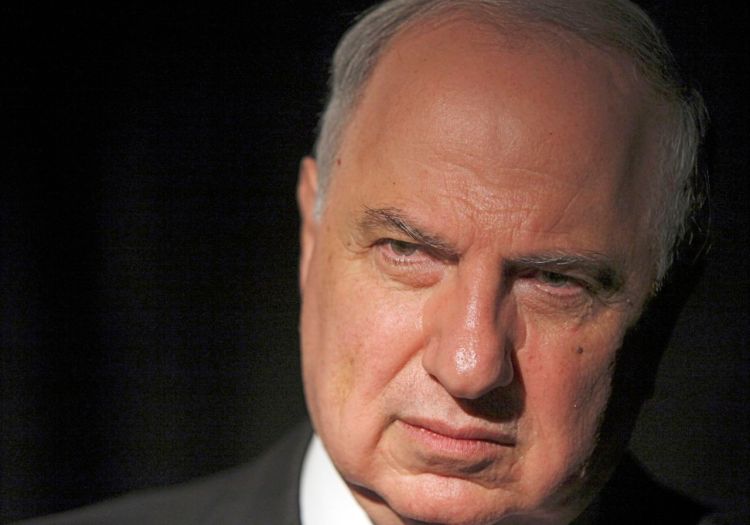 Ahmad Chalabi, listens to a question during a 2010 interview. Chalabi, a prominent politician who strongly advocated the 2003 U.S.-led invasion to overthrow Saddam Hussein, has died of a heart attack. The Associated Press