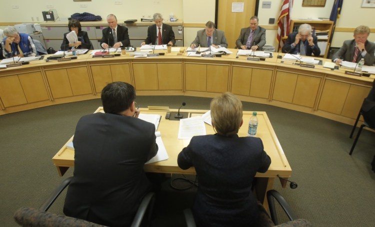 Cynthia Montgomery, right, legal counsel to Gov. Paul LePage, answers questions before the Government Oversight Committee on Thursday. When it reconvenes Dec. 3, the committee is unlikely to propose impeachment or refer its findings to the Attorney General's Office to determine whether any laws were broken.