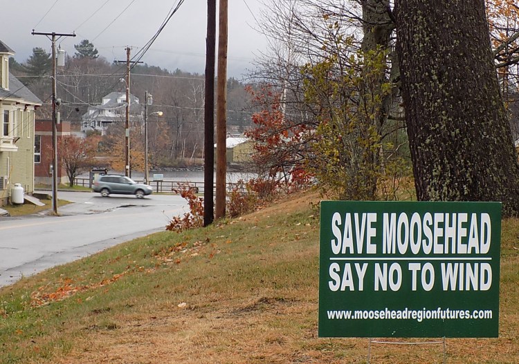 A sign in Somerset County urges opposition to wind projects in the Moosehead region. Maine Department of Transportation workers took down as many as 50 signs Friday in Greenville and Rockwood. Courtesy photo