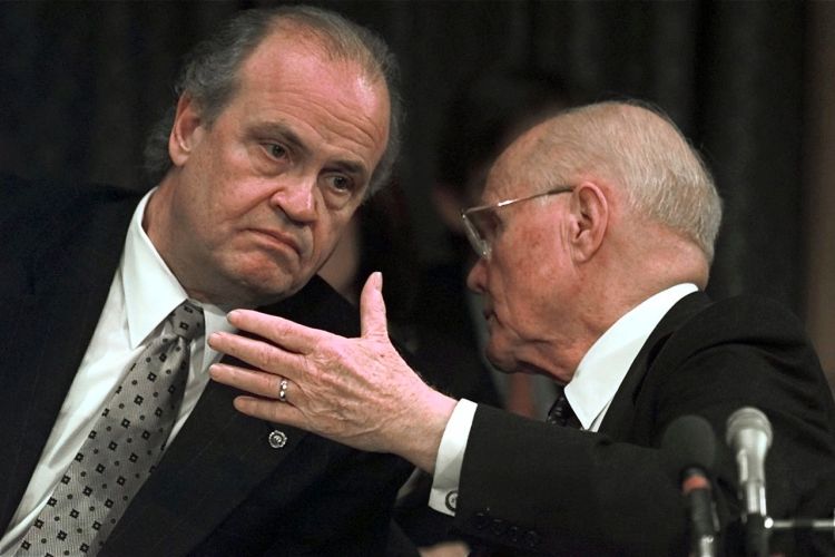 In this 1998  photo, Senate Campaign Finance Committee Chairman Fred Thompson, R-Tenn, left, listens to co-chair Sen. John Glenn, D-Ohio, before the full committee voted to adopt the majority's report on Campaign Fund Raising. The Associated Press