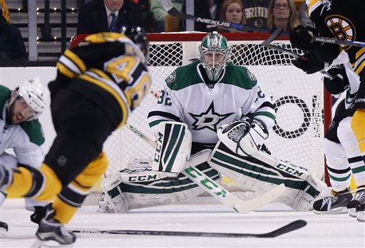 Bruins' David Krejci, foreground, takes a shot on the Stars' Kari Lehtonen during the third period in Boston on Tuesday.
The Associated Press