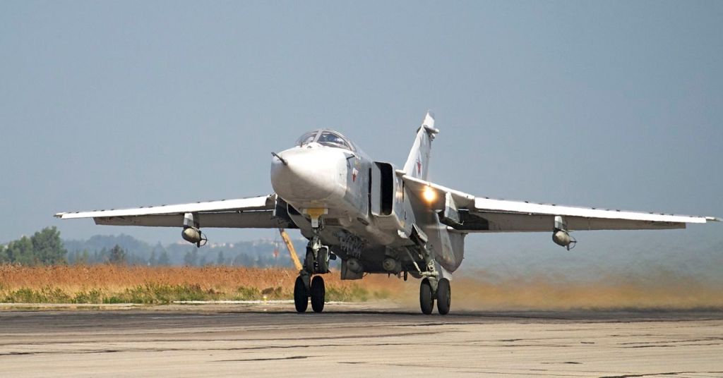 A Russian Su-24 takes off on a combat mission at Hemeimeem airbase, Syria, in this Oct. 22 photo  Russian news agencies say the warplane shot down Tuesday did not violate the Turkish airspace. The Associated Press