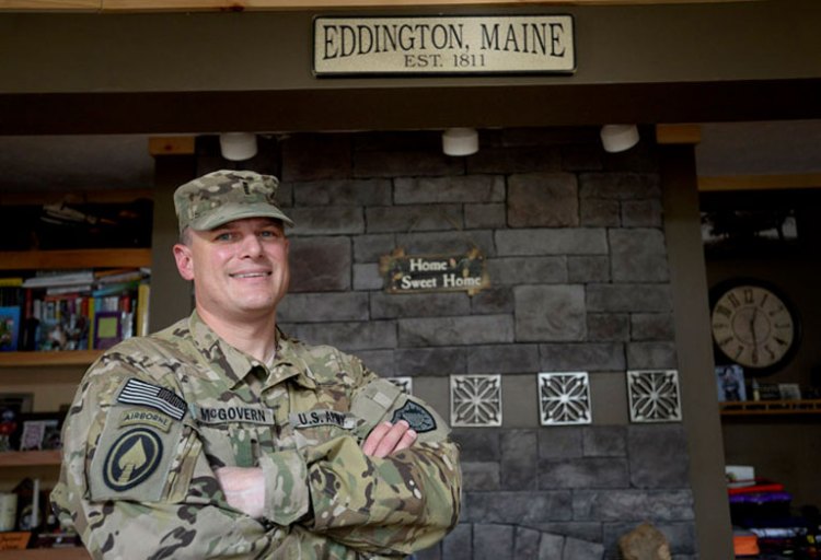 Chief Warrant Officer Mike McGovern, seen here at home in Eddington last week, recently returned home from his second tour in Afghanistan. The military pilot has also done tours of duty in Iraq and Bosnia. Shawn Patrick Ouellette / Staff Photographer