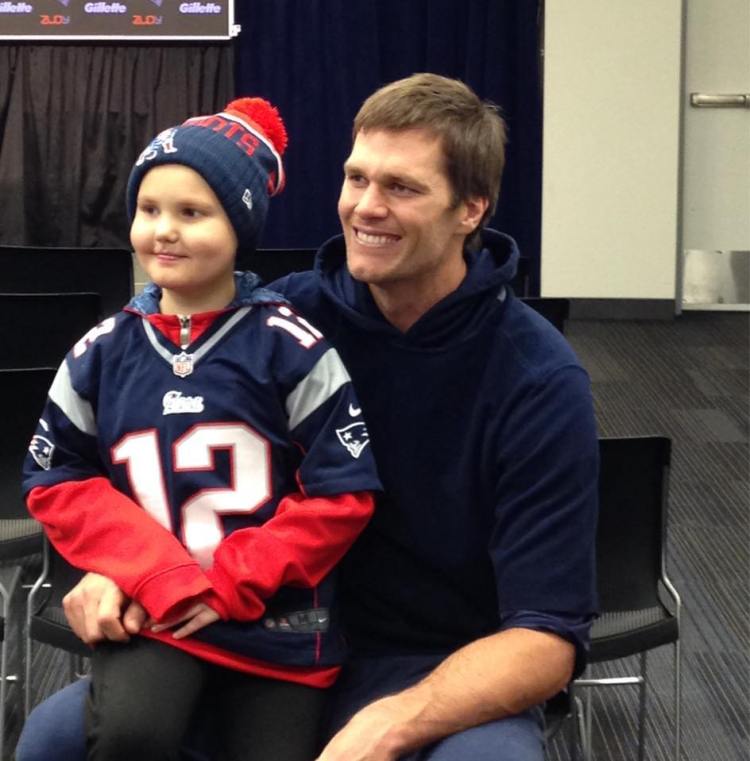 New England Patriots quarterback Tom Brady with super fan Hailey Steward of Bethel, who has leukemia. Brady invited Hailey to visit him at the team's Foxborough, Mass, headquarters after reading her story in the Portland Press Herald. 