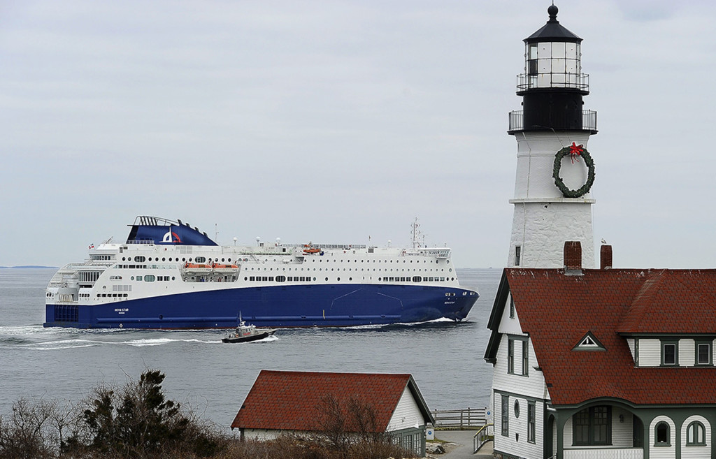 The Nova Star leaves Portland and passes the Portland Head Light as it heads out to sea. Gordon Chibroski/Staff Photographer