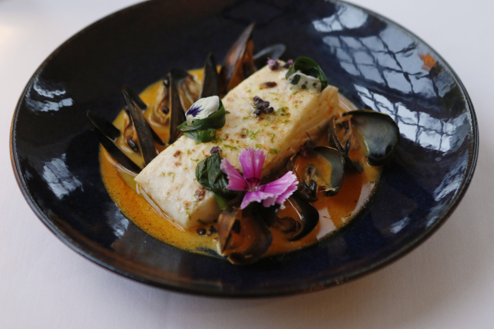 Steamed halibut with mussels.